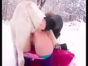 Woman outdoors with dog
