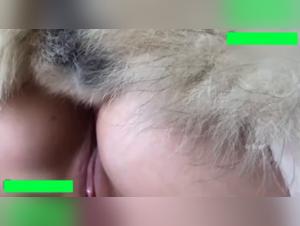 She's got him tight, that dog stuck in her hole, she's loving it!