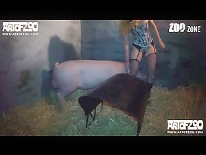 Beautiful blonde offering her pussy to a dog
