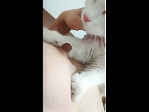 The slut sucks her dog
