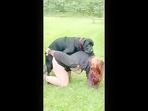Woman and her dog in nature