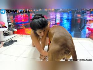 Canine Debauchery: Barbara Enjoys with Two Dogs