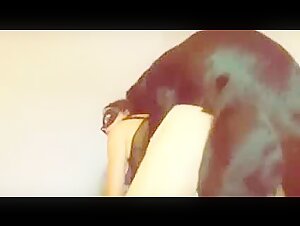 Woman Submissive to a Dog