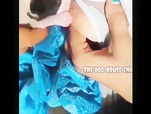 Dog breastfeeding his mistress