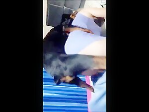 Woman submissive to her dog 002
