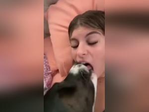 Canine pleasure pedal: She gets down with her dog and a shovel