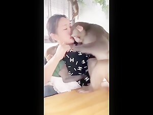 Asian woman and dog: a beastly encounter